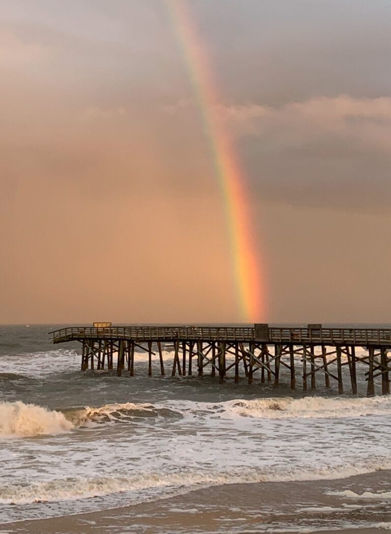 rainbow over Flagler Beach pier December 28 weather tides